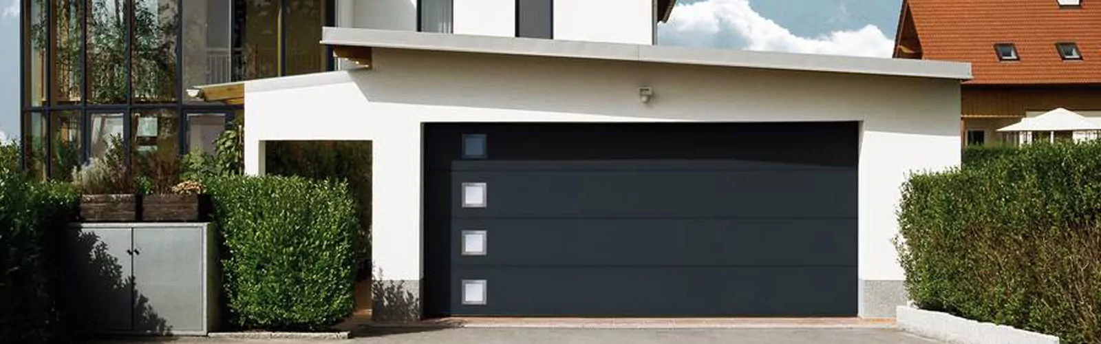 /files/dateien/Tuer/csm_Garagentor_schwarz_56117b95cf_Header-1600x500.jpg.webp